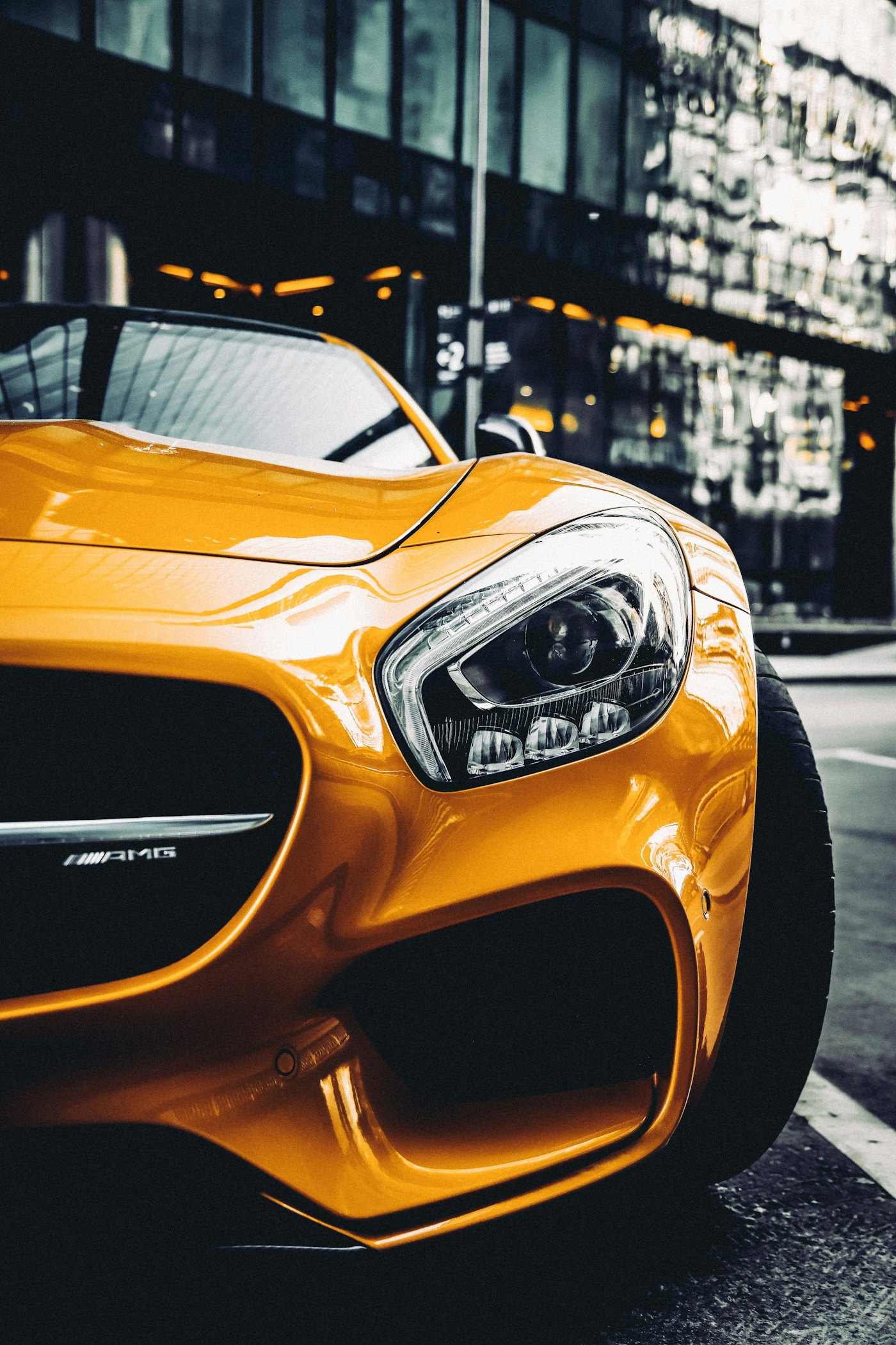 A yellow Porsche 911, the kind of vehicle shipped enclosed