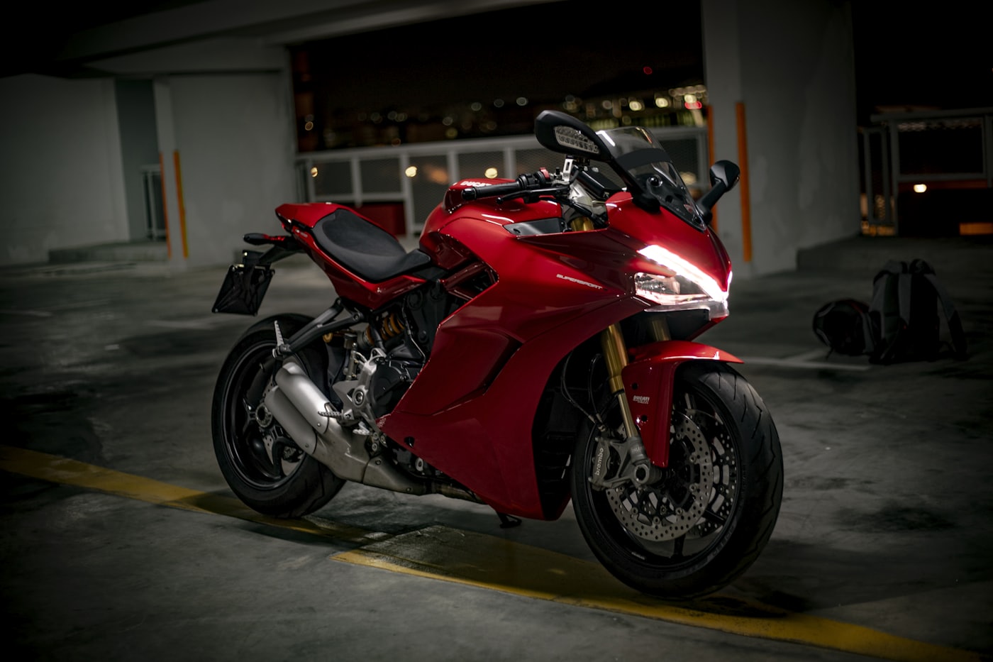 A red and black sport motorcycle
